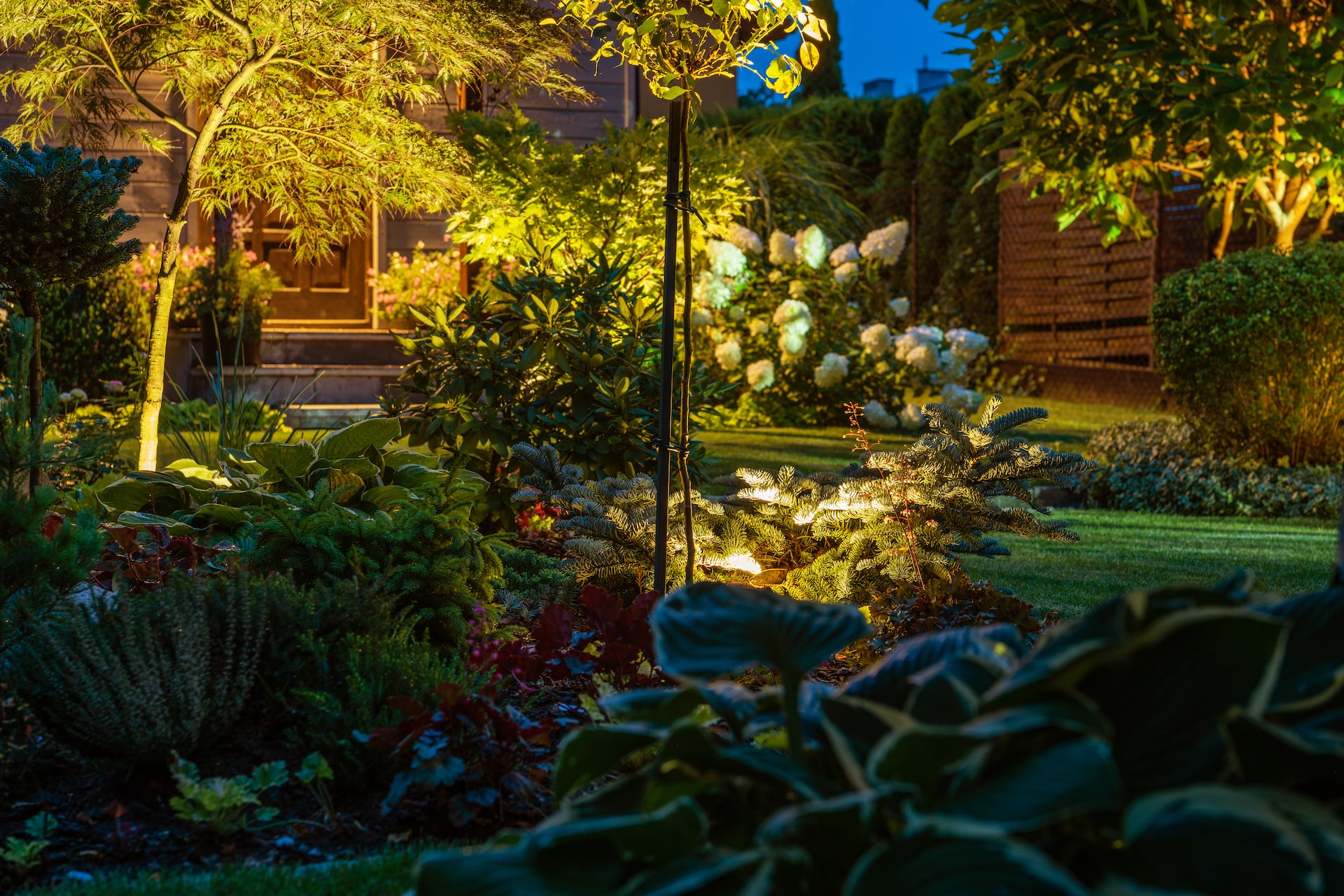 rockery garden,landscaping,aerial,rocks,stone,plant,gardener,established,professional,work,job,labor,male,granite,outdoor,home,botanic,specie,profession,landscaper